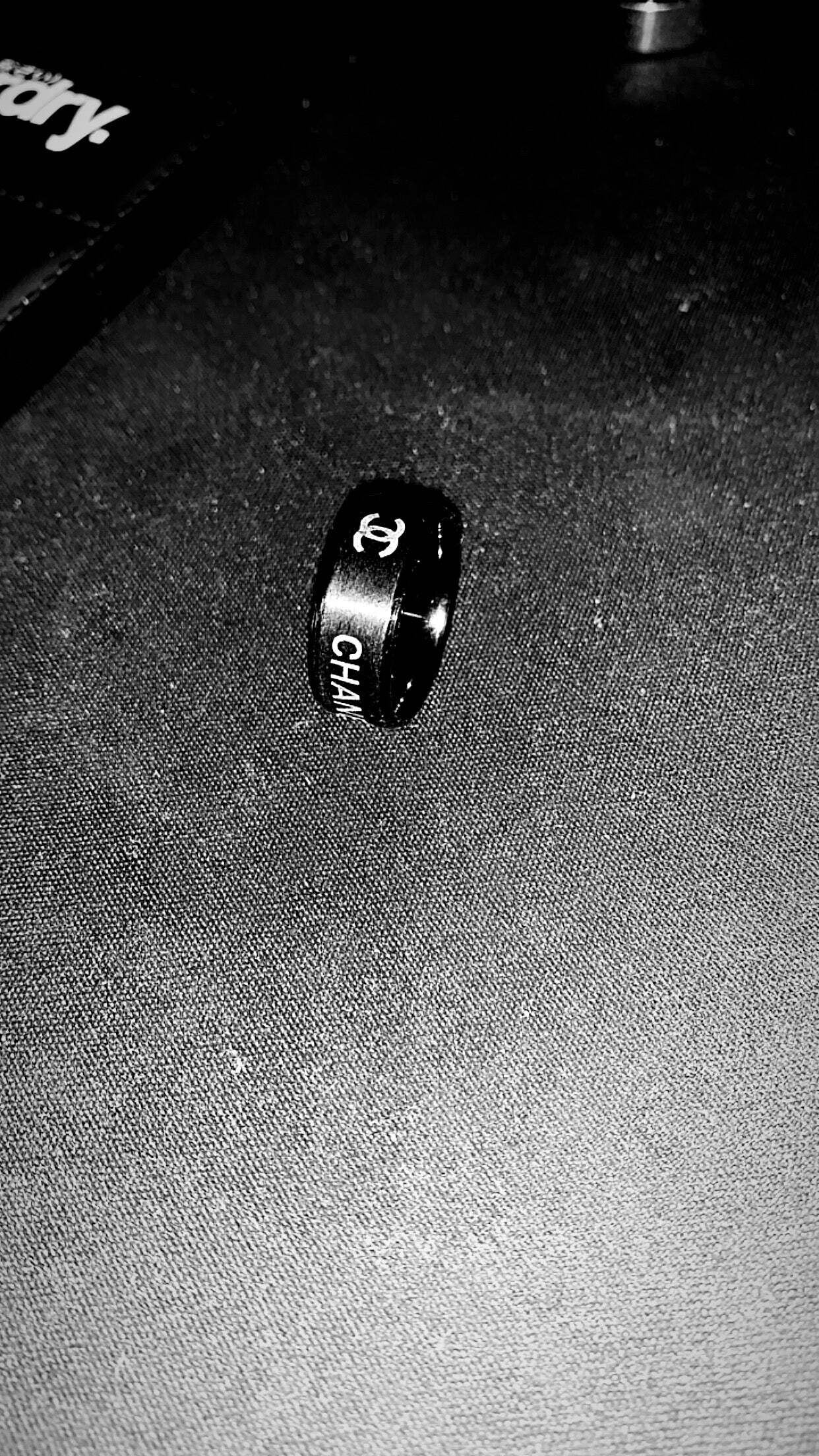 D3875F7D-755B-49A3-BFA0-471AC332AD67 Black Titanium Chanel Ring - Image 1